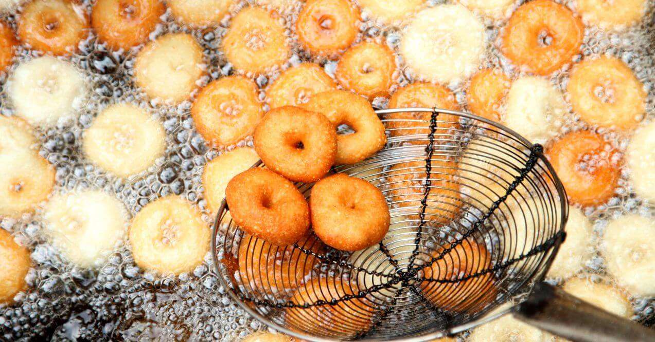 Deep frying donuts in oil