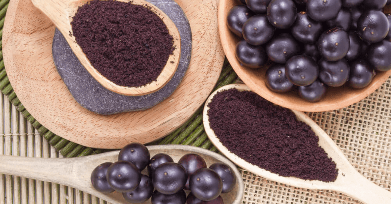 Fruits and acai powder originating from the Amazon on wood