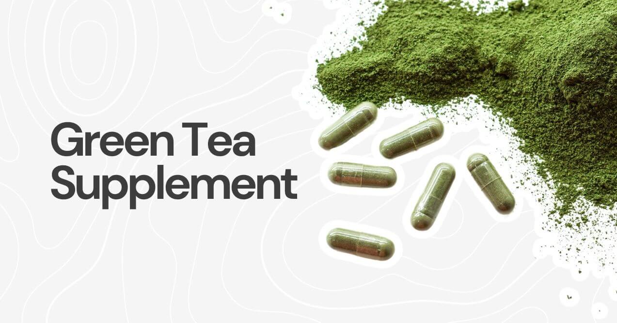 Green tea powder and capsules scattered on a white background.