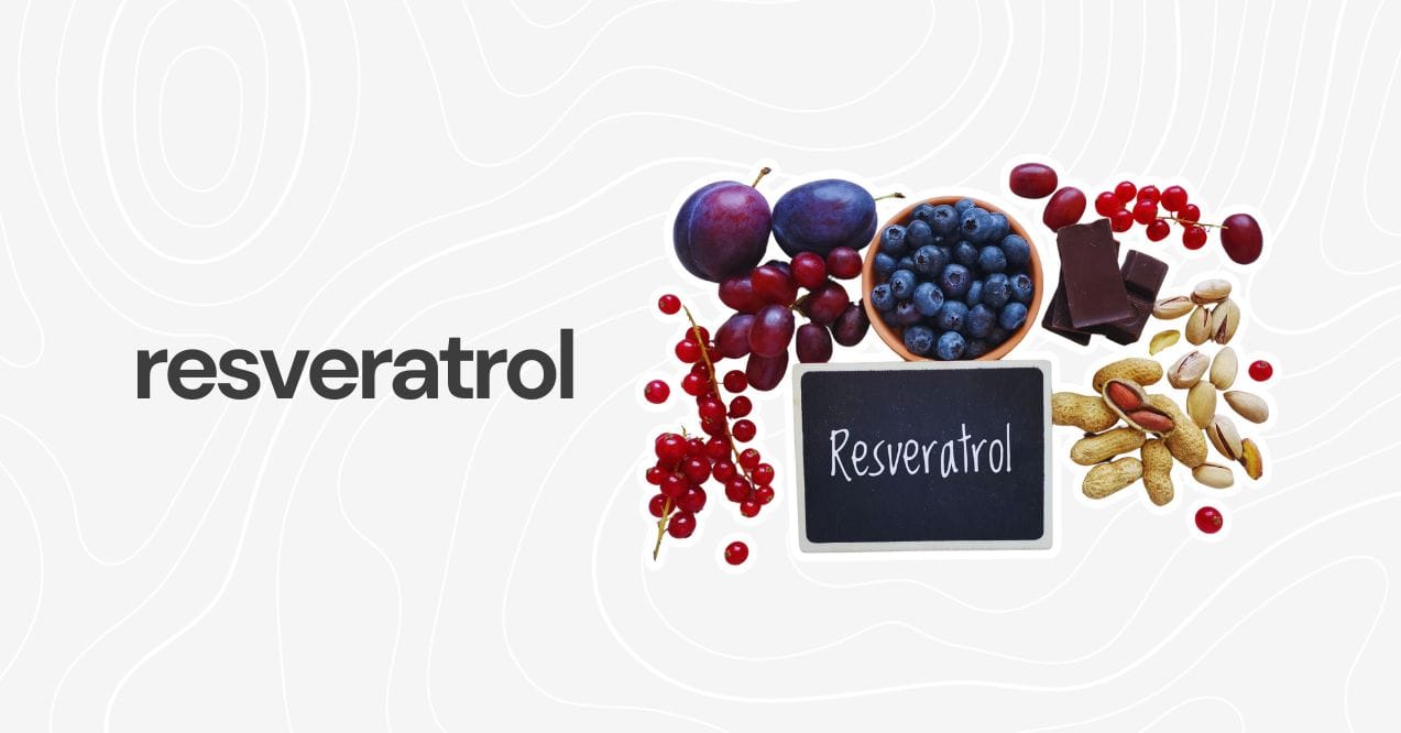 Resveratrol-rich foods like blueberries, grapes, and dark chocolate with a labeled chalkboard.