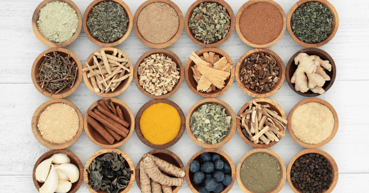 Adaptogen healthy food with herbs, spices, fruit and supplement powders.