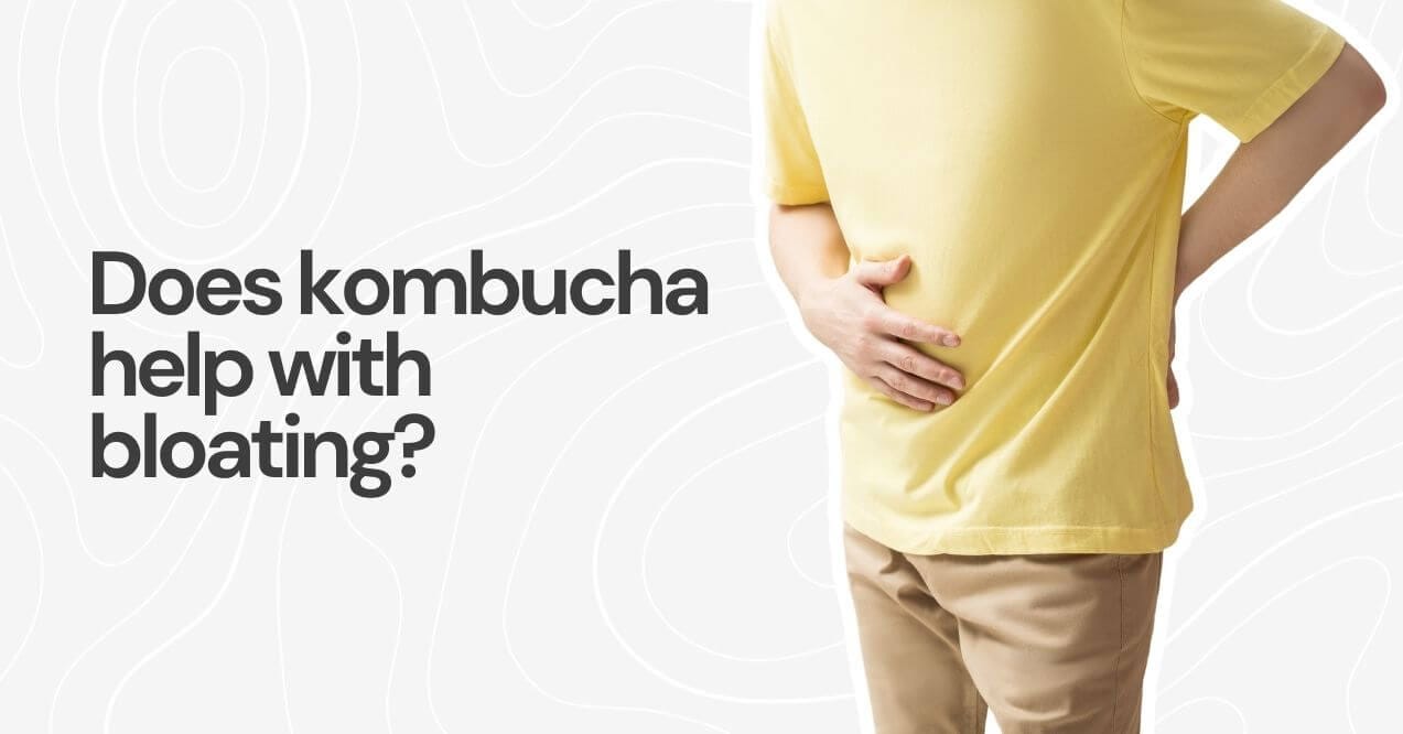 Person holding their stomach with text asking if kombucha helps with bloating.