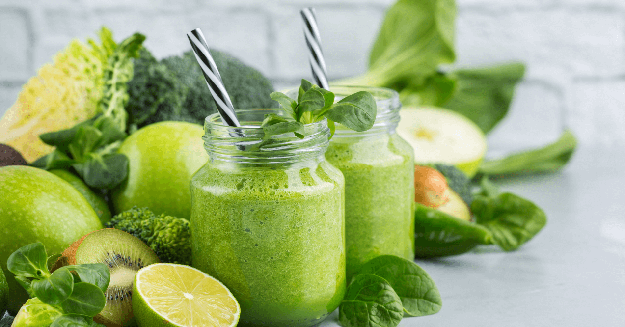 Food and drink, healthy dieting and nutrition, lifestyle, vegan, alkaline, vegetarian concept. Green smoothie with organic ingredients, vegetables on a modern kitchen table