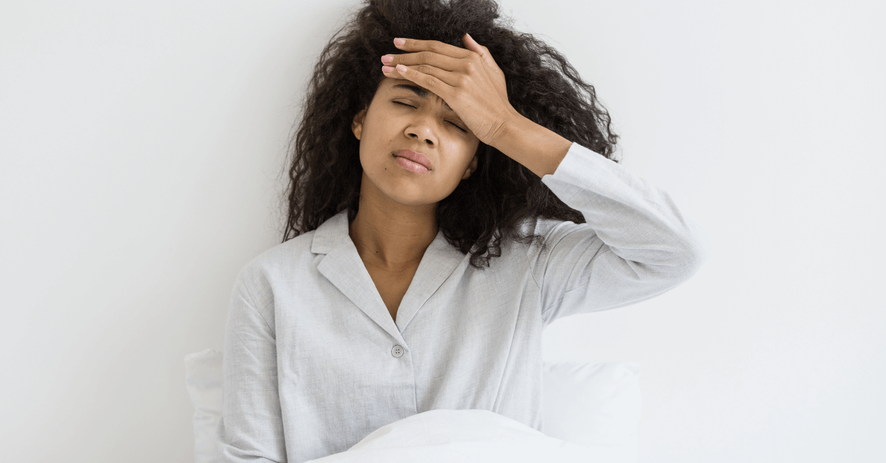 Woman experiencing a headache