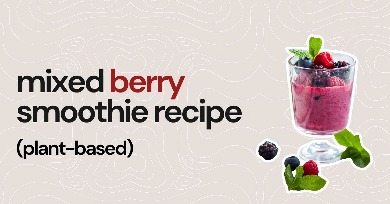 mixed berry smoothie recipe featured image showing a glass of red smoothie with berries
