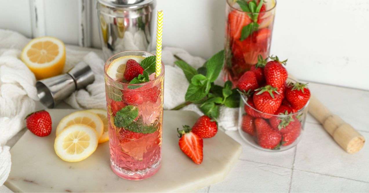 a glass of strawberry mojito mocktail on the counter
