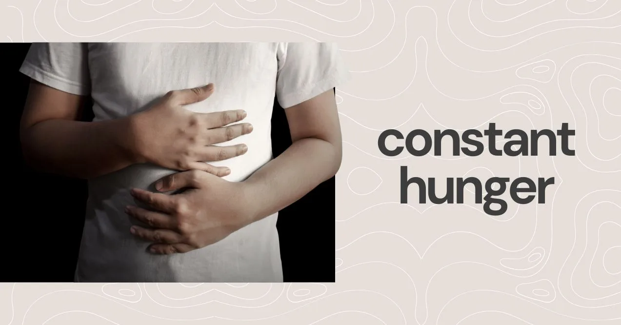 constant hunger illustration, male covering his stomach zoomed in with text "constant hunger" next to it