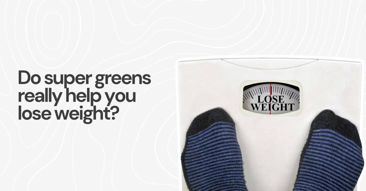 Person standing on a scale with 'lose weight' text, questioning super greens' effect on weight loss.