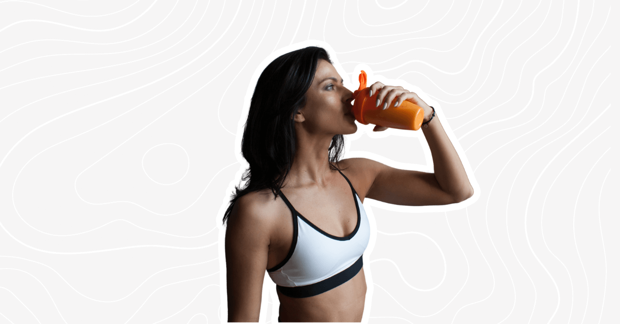 woman drinking pre workout