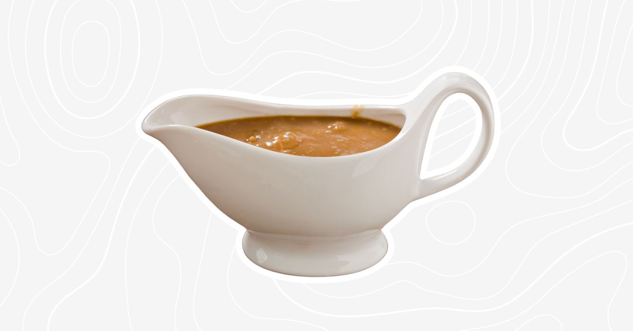 Gravy boat filled with rich bone broth gravy, ideal for enhancing meals.