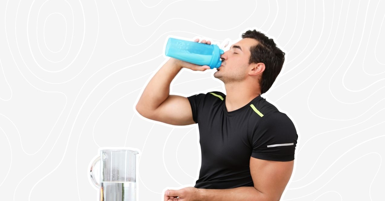 Man drinking from a shaker bottle, representing hydration while using creatine supplements.