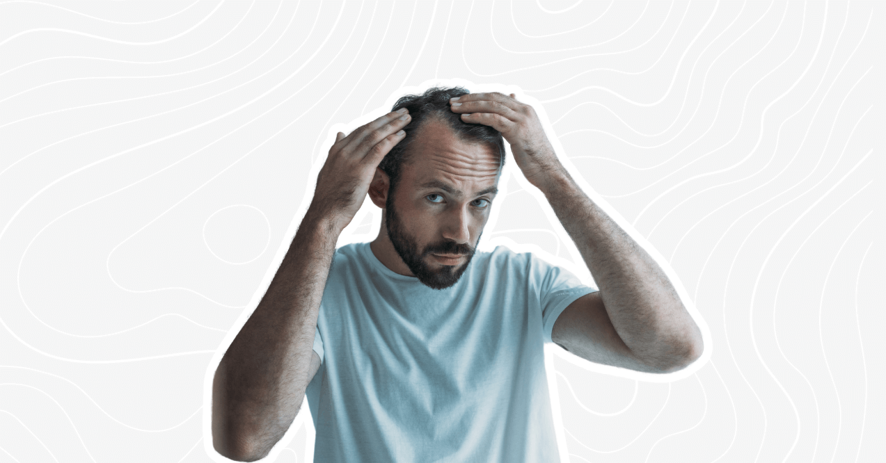 man checking his hair