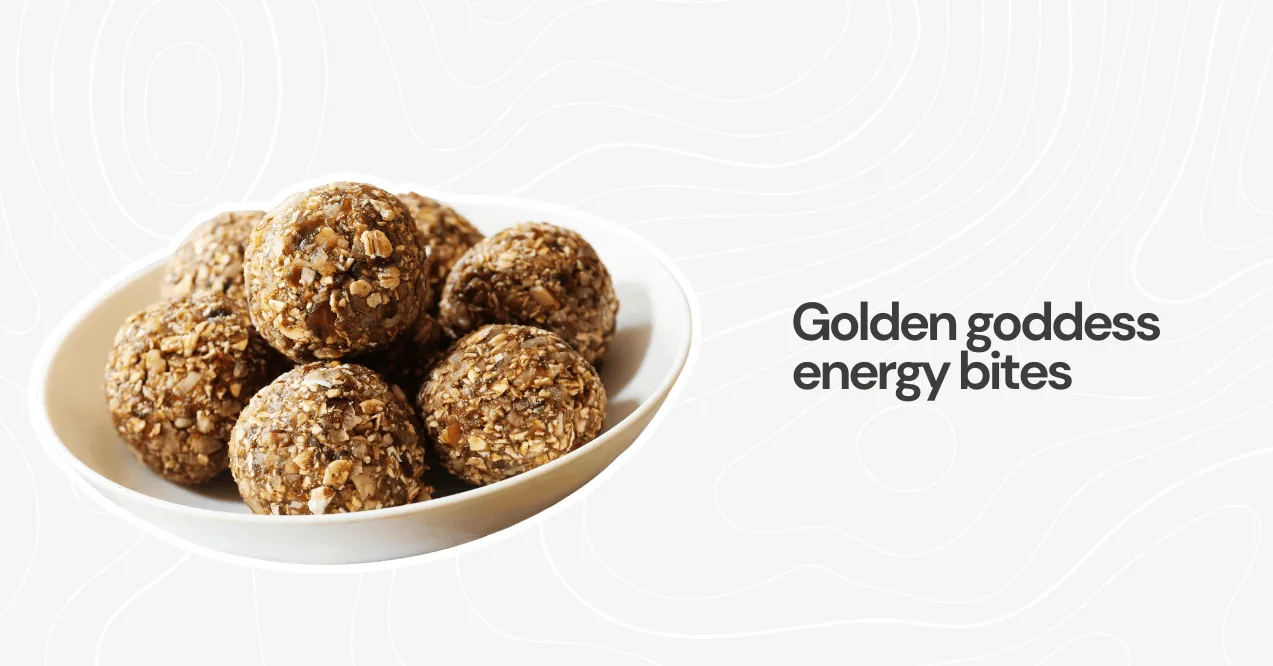 A plate of homemade golden goddess energy bites made with oats, nuts, and protein powder, a perfect on-the-go snack.