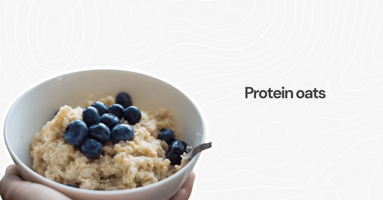 A bowl of protein-rich oatmeal topped with fresh blueberries, providing a nutritious and energizing breakfast.