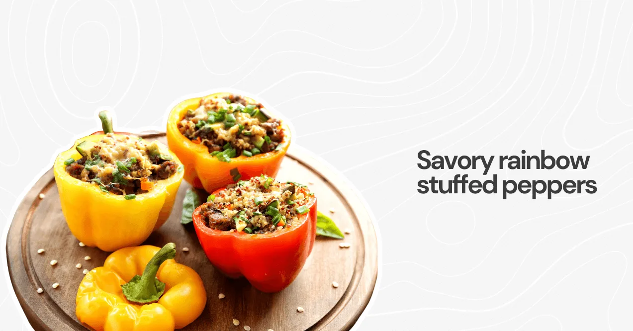 Colorful stuffed bell peppers filled with a nutritious mixture of rice, beans, and vegetables, topped with fresh herbs.