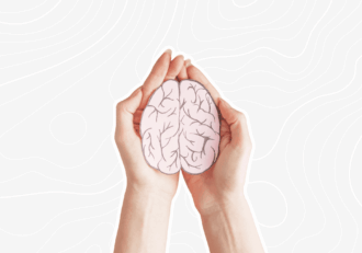 woman holding a brain example